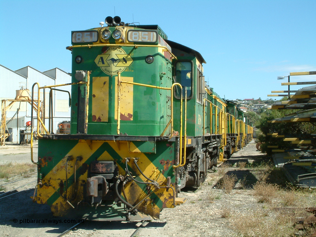 030406 115424
Port Lincoln loco workshops, still in former owner AN livery, Australian Southern 830 class locomotive 851 AE Goodwin ALCo model DL531 serial 84137 which has been on the Eyre Peninsula Division since being built in April 1962, stabled motive power over the weekend downtime. 6th April 2003.
Keywords: 830-class;851;84137;AE-Goodwin;ALCo;DL531;