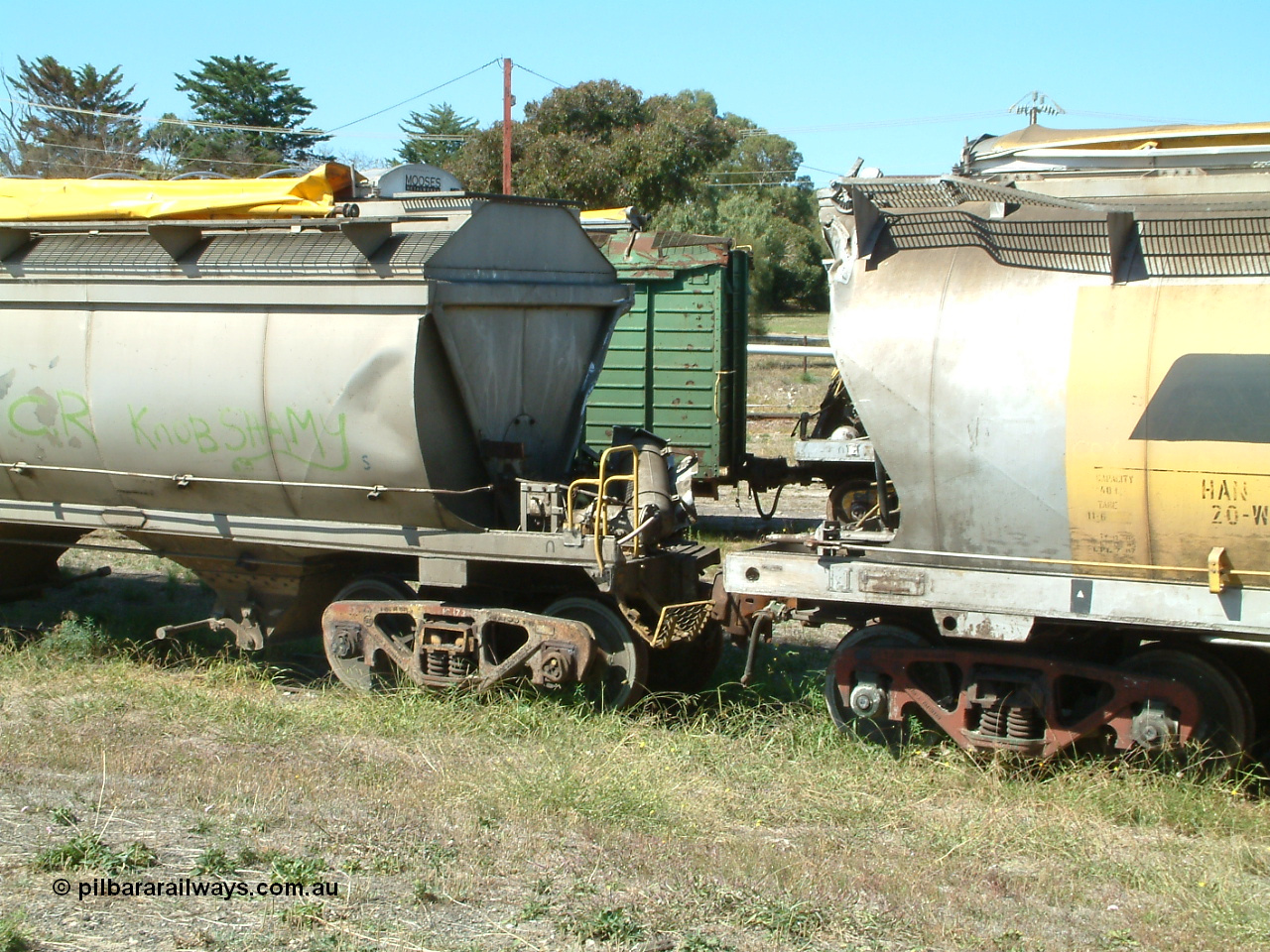 030406 115608
Port Lincoln, derailment damaged SAR Islington Workshops built HAN type bogie wheat waggons HAN 20, non-handbrake end and an unidentified HCN type close up of non-handbrake end damage, stored at the workshops yards. 6th April 2003.
Keywords: HAN-type;HAN20;1969-73/68-20;SAR-Islington-WS;