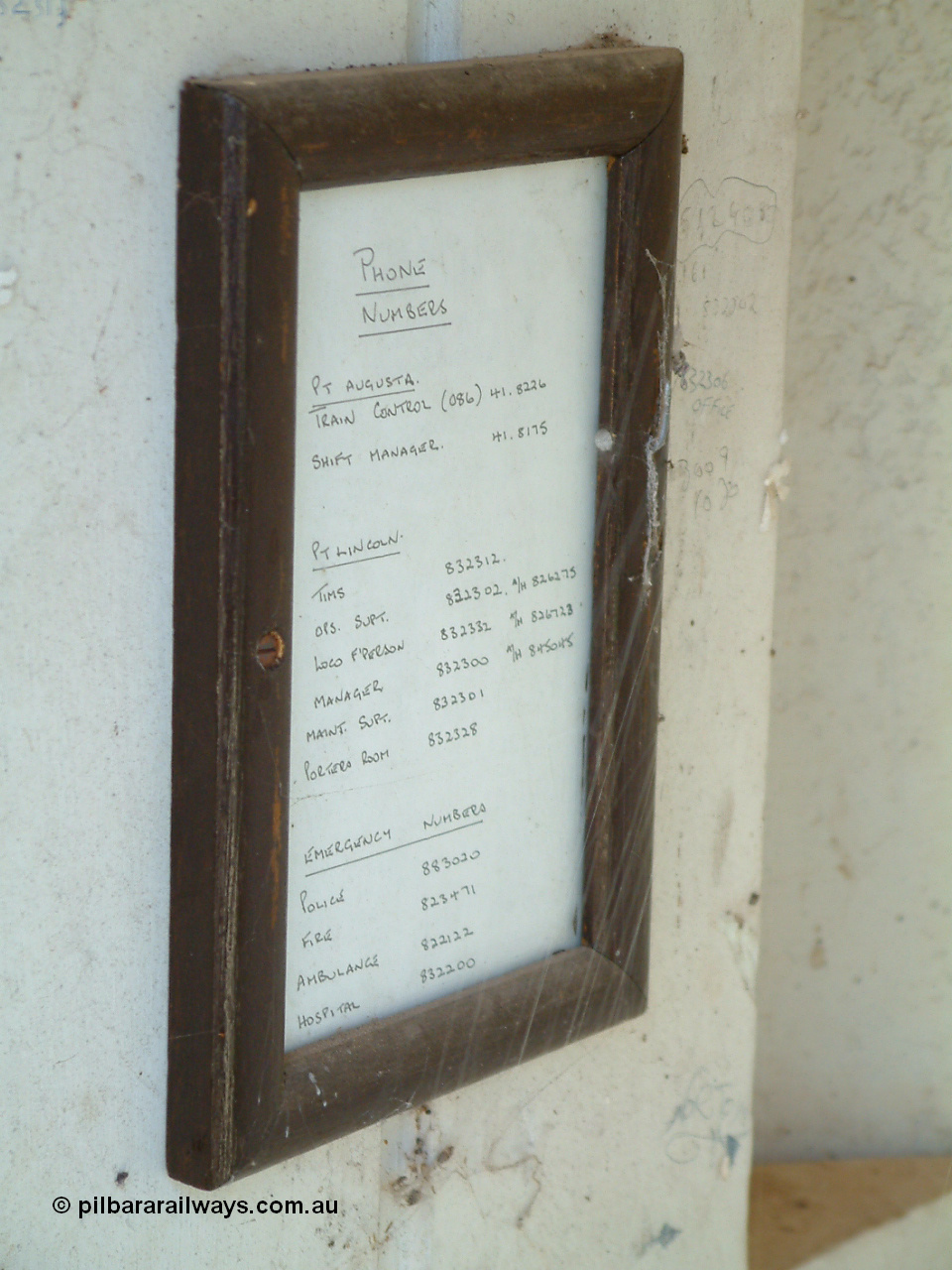 030406 142828
Kapinnie, phone number board inside the train control cabin. 6th April 2003.
