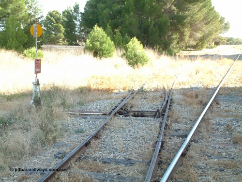 030406 092406
Yeelanna, yard view of the station siding looking north with the points, lever and indicator for the south leg of the triangle and line curving away to the left visible. April 6, 2003.
