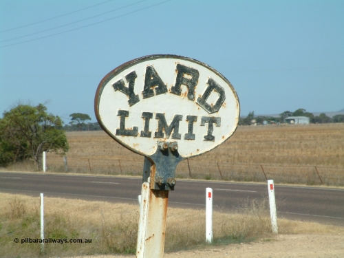 030406 101336
Cummins, original cast iron 'A6' type South Australian Railways, or SAR, YARD LIMIT sign bolted to a rail post. April 6, 2003.
