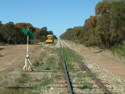 030406 110950
Coomunga, station located at the 21.6 km, opened in November 1907, used these days as a track maintenance siding. Yard overview looking south from the north end points, track machines on the left. April 6, 2003.
