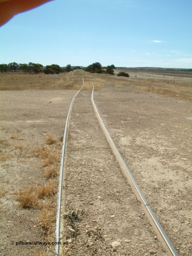 030406 142256
Kapinnie, track view looking west towards the terminus showing the siding extension with offset in rails, silos and loading ramp behind camera. April 6, 2003.
