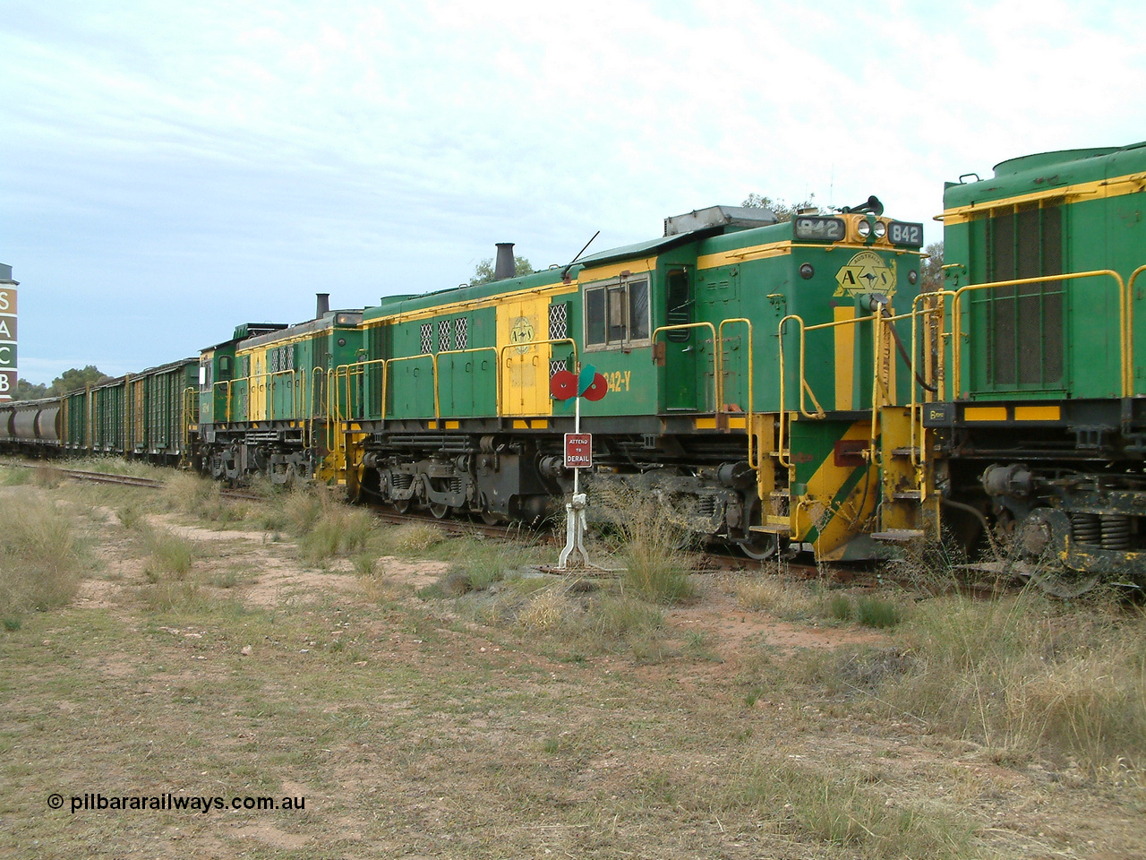 030407 082751
Wudinna, empty grain train shunts back into the grain siding, former Australian National Co-Co locomotives AE Goodwin ALCo model DL531 830 class units 842, serial no. 84140 and 851 serial no. 84137, 851 having been on the Eyre Peninsula since delivered in 1962. 7th April, 2003.
Keywords: 830-class;842;84140;AE-Goodwin;ALCo;DL531;