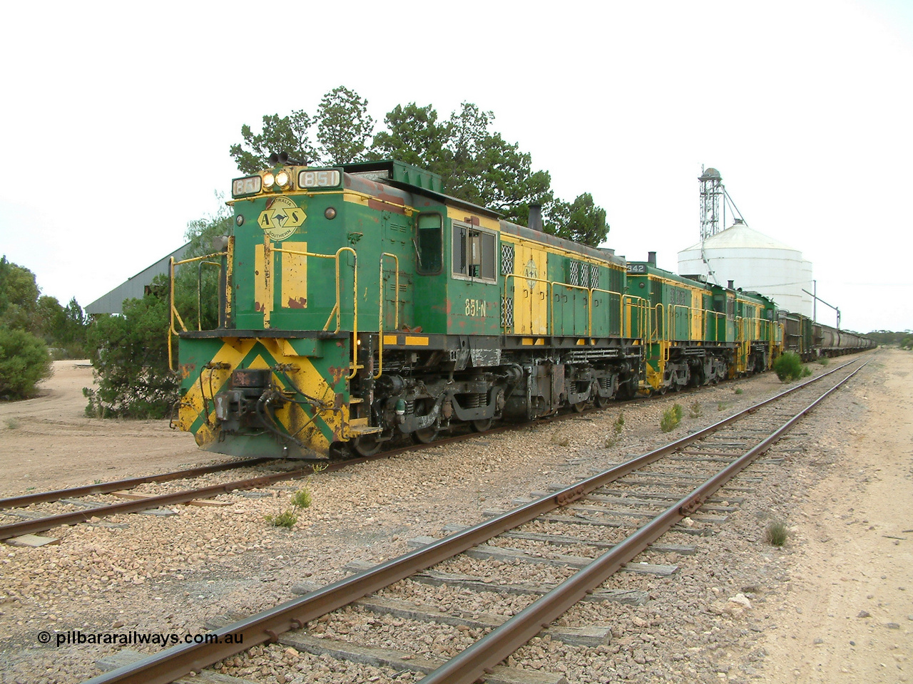 030407 120514
Poochera, the loaded train prepares to depart behind 830 class unit 851 AE Goodwin ALCo model DL531 serial 84137, 851 has spent its entire operating career on the Eyre Peninsula, it leads fellow 830 class 842 serial 84140 and a rebuilt unit DA 4, rebuilt from 830 class unit 839 by Port Augusta Workshops, retains original serial 83730 and model DL531.
Keywords: 830-class;851;84137;AE-Goodwin;ALCo;DL531;