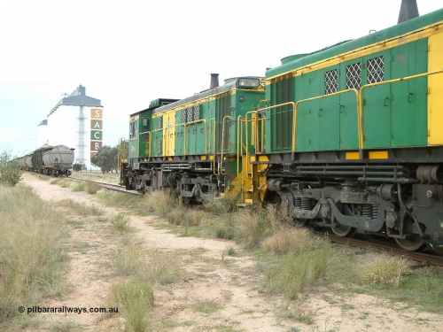 030407 083359
Wudinna, empty grain train shunts back onto train on the mainline, former Australian National Co-Co locomotive AE Goodwin ALCo model DL531 830 class units 851 serial no. 84137 has been on the Eyre Peninsula since delivered in 1962. April 7, 2003.
Keywords: 830-class;851;AE-Goodwin;ALCo;DL531;84137;