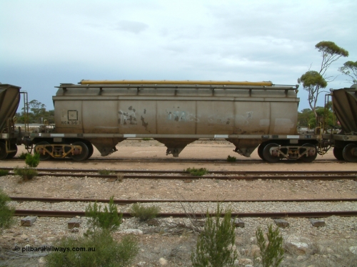 030407 105517
Poochera, track view and side view of HCN type bogie wheat waggon HCN 36, modified at Islington Workshops in 1978-80 which started life as a Tulloch built NHB type iron ore hopper for the CR on the North Australia Railway in 1968-69, showing the roll top covers. April 7, 2003.
Keywords: HCN-type;HCN36;SAR-Islington-WS;rebuild;Tulloch-Ltd-NSW;NHB-type;NHB1592;
