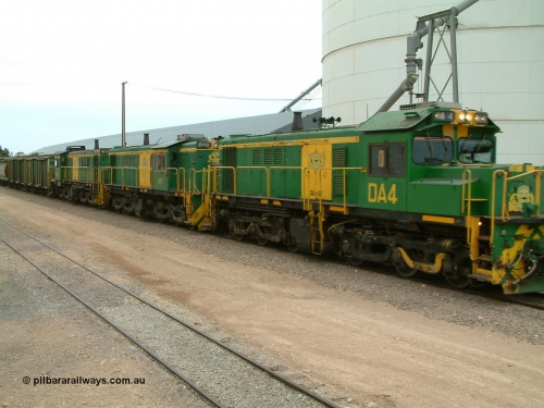 030407 114338
Poochera, empty grain train arrives behind a trio of former Australian National Co-Co locomotives with rebuilt former AE Goodwin ALCo model DL531 830 class ex 839, serial no. 83730, rebuilt by Port Augusta Workshops to DA class, DA 4 leading two AE Goodwin ALCo model DL531 830 class units 842, serial no. 84140 and 851 serial no. 84137, 851 having been on the Eyre Peninsula since delivered in 1962, to shunt off empty waggons and pick up the loaded ones. April 7, 2003.
Keywords: DA-class;DA4;83730;Port-Augusta-WS;ALCo;DL531G/1;830-class;839;rebuild;