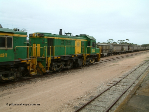 030407 114344
Poochera, empty grain train arrives behind former Australian National locomotive rebuilt from former AE Goodwin ALCo model DL531 830 class ex 839 serial 83730 by Port Augusta Workshops to DA class unit DA 4 to shunt off empty waggons and pick up the loaded ones. April 7, 2003.
Keywords: DA-class;DA4;83730;Port-Augusta-WS;ALCo;DL531G/1;830-class;839;rebuild;