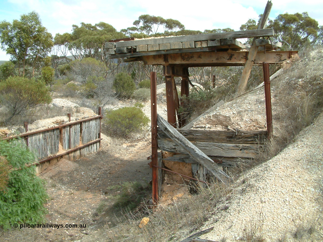 030409 113246
Darke Peake, ballast loading ramp and retaining wall looking west, station site is behind photographer.
