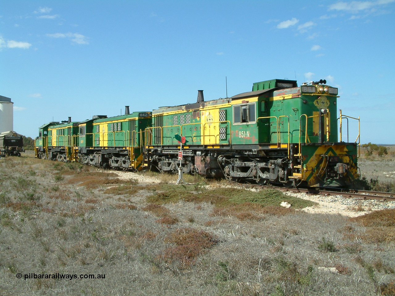 030409 140653
Wharminda, the engines 830 class unit 851 AE Goodwin ALCo model DL531 serial 84137, fellow 830 class 842 serial 84140 and a rebuilt unit DA 4 have cut off and run forward as they shunt to pick up loaded waggons.
Keywords: 830-class;851;84137;AE-Goodwin;ALCo;DL531;