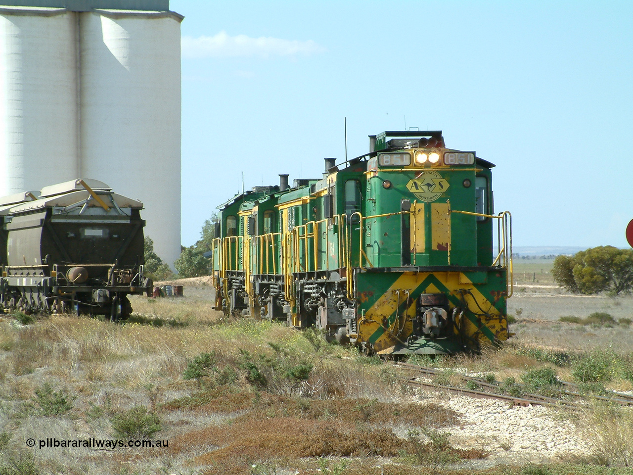 030409 140821
Wharminda, the engines 830 class unit 851 AE Goodwin ALCo model DL531 serial 84137, fellow 830 class 842 serial 84140 and a rebuilt unit DA 4 shunt back into the grain loop to pick up loaded waggons.
Keywords: 830-class;851;84137;AE-Goodwin;ALCo;DL531;