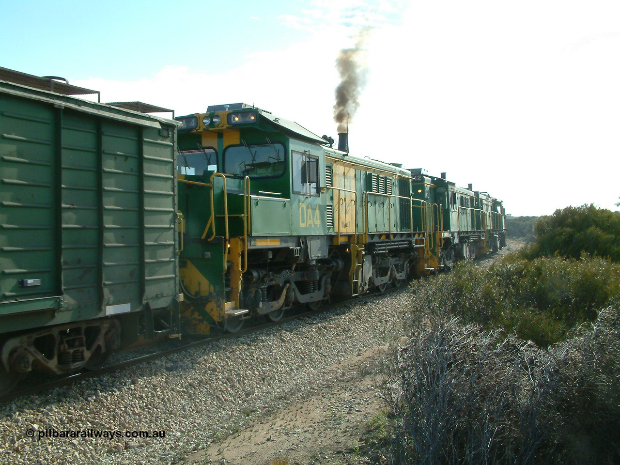 030409 153952
Moody Tank, a loaded grain train storms around the curve behind 830 class unit 851 AE Goodwin ALCo model DL531 serial 84137, fellow 830 class 842 serial 84140 and a rebuilt DA class unit DA 4, trailing view.
Keywords: DA-class;DA4;83730;Port-Augusta-WS;ALCo;DL531G/1;830-class;839;rebuild;