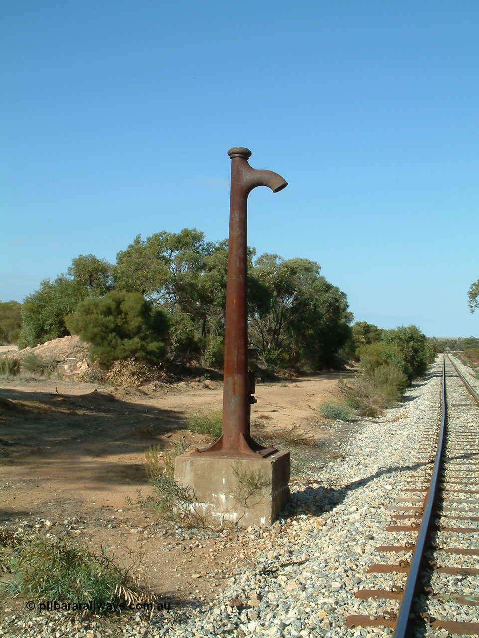 030409 154732
Moody Tank, located at the 101.5 km the cast iron standpipe which dates from 1915 still stands sentinel beside the line, albeit out of use.
