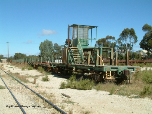 030411 105938
Kimba, rail recovery waggon set with winch waggon EZWL 2, eight ENFR type and one ENFB type waggons. The cabin is mounted above the motor, built using underframe of broad gauge horse box BH 4331. To Eyre Peninsula 1992, re-coded then from AZWL. Scrapped in 2005.
Keywords: EZWL-type;EZWL2;SAR-Islington-WS;BH-type;BH4331;