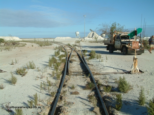 030414 163800
Kevin, , the points for the mainline to Penong Junction (Ceduna) with that line curving away to the left, straight ahead is the former gypsum loading bins.
