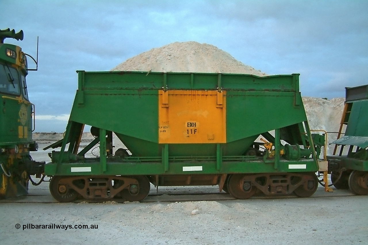 030415 065911
Kevin, originally one of sixty two Kinki Sharyo built NH type for the NAR in 1966, sent to Eyre Peninsula in 1985 and recoded to ENH type, ENH 11 with hungry boards fitted and loaded with gypsum on train 3DD2 at the [url=https://goo.gl/maps/fjUHW]Kevin loading point[/url].
Keywords: ENH-type;ENH11;Kinki-Sharyo-Japan;NH-type;