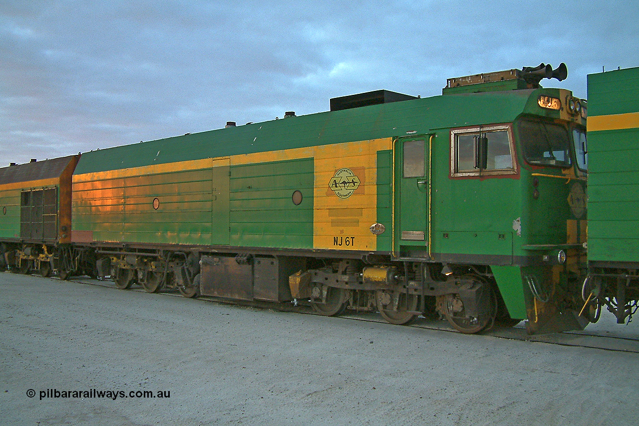 030415 065944
Kevin, NJ class Clyde Engineering EMD JL22C model unit NJ 6 serial 71-733, built in 1971 at Clyde's Granville NSW workshops, started out on the Central Australia Railway for the Commonwealth Railways before being transferred to the Eyre Peninsula system in 1981. Still in AN green but lettered for Australian Southern Railroad. At the [url=https://goo.gl/maps/fjUHW]Kevin loading point[/url].
Keywords: NJ-class;NJ6;71-733;Clyde-Engineering-Granville-NSW;EMD;JL22C;