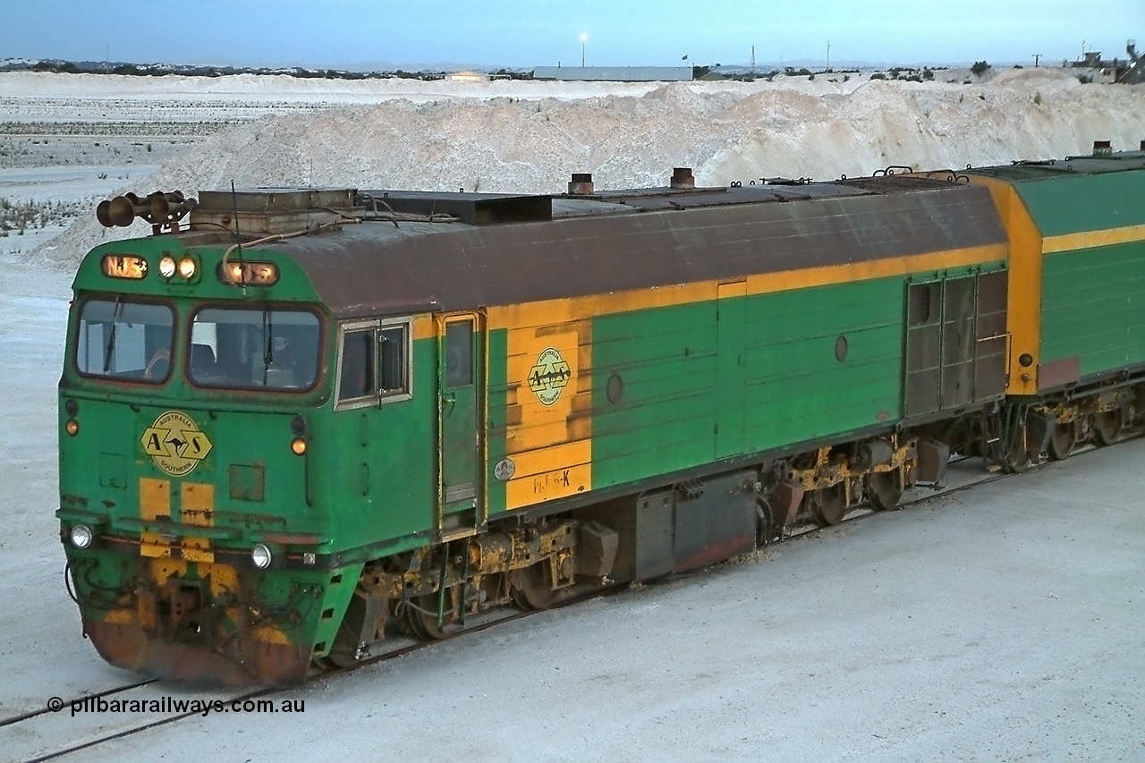 030415 070420
Kevin, NJ class Clyde Engineering EMD JL22C model unit serial 71-732, built in 1971 at Clyde's Granville NSW workshops, started out on the Central Australia Railway for the Commonwealth Railways before being transferred to the Eyre Peninsula system in 1981. Still in AN green but lettered for Australian Southern Railroad. At the [url=https://goo.gl/maps/fjUHW]Kevin loading point[/url].
Keywords: NJ-class;NJ5;71-732;Clyde-Engineering-Granville-NSW;EMD;JL22C;