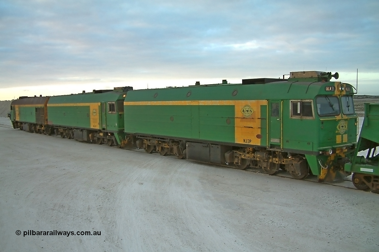 030415 071138
Kevin, loading is almost complete 0700 hrs. as gypsum train 3DD2 stands behind triple NJ class Clyde Engineering EMD JL22C model units serial 71-732, NJ 6 serial 71-733 and NJ 3 serial 71-730, these units built in 1971 at Clyde's Granville workshops started out on the Central Australia Railway for the Commonwealth Railways before being transferred to the Eyre Peninsula system in 1981. At the [url=https://goo.gl/maps/fjUHW]Kevin loading point[/url].
Keywords: NJ-class;NJ3;71-730;Clyde-Engineering-Granville-NSW;EMD;JL22C;