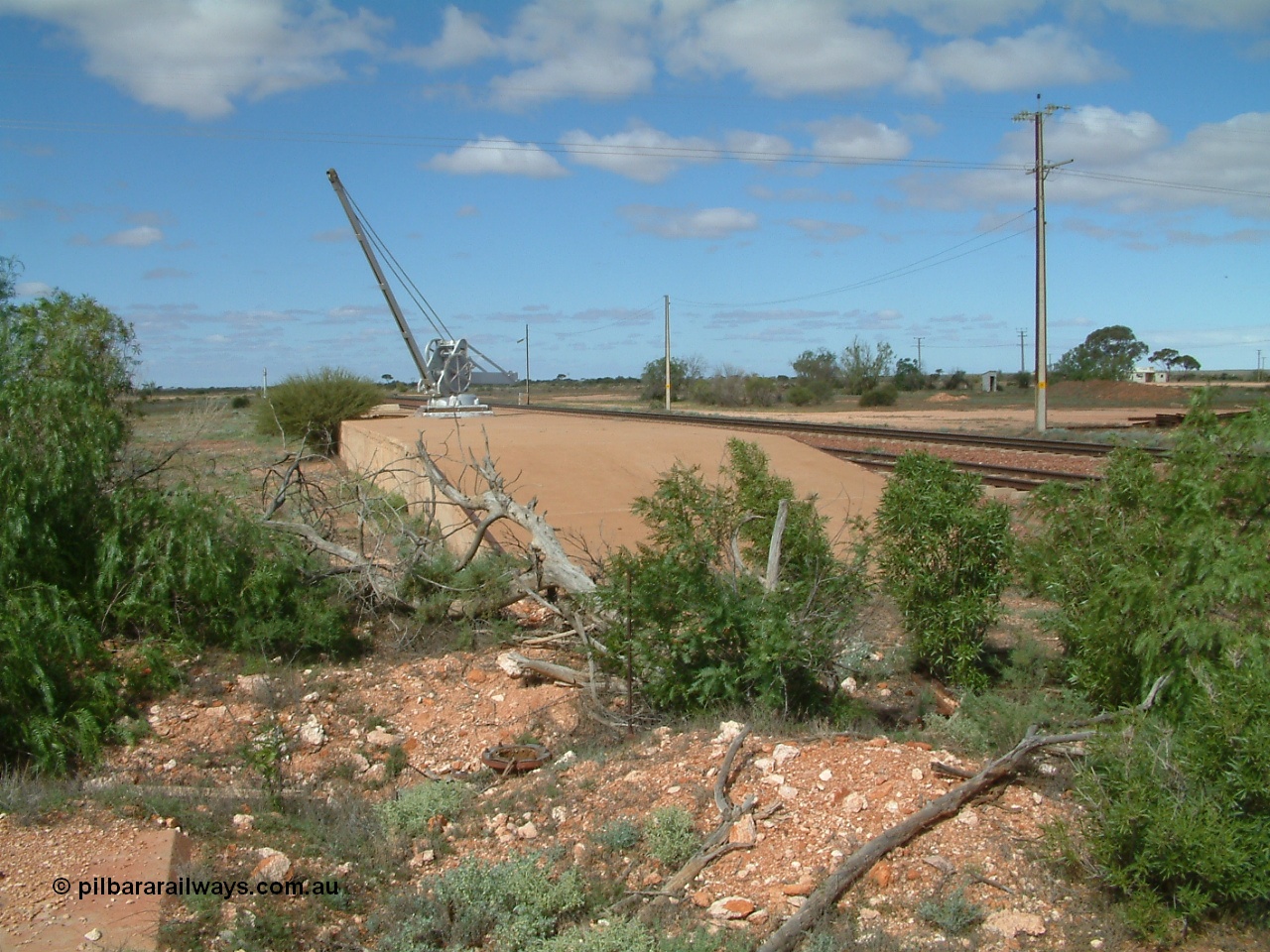 030415 135950
Kingoonya, located at the 426.5 km on the Trans Australian Railway, loading ramp and crane. [url=https://goo.gl/maps/JoaJ36uYKDkgepas9]GeoData location[/url].
