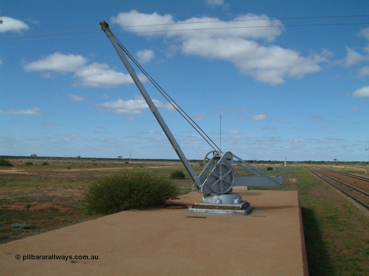 030415 140027
Kingoonya, located at the 426.5 km on the Trans Australian Railway, top of loading ramp and crane. Located on the north side of the line. [url=https://goo.gl/maps/JoaJ36uYKDkgepas9]GeoData location[/url].
