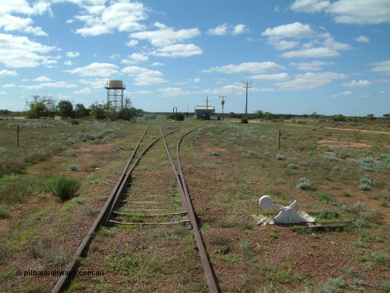 030415 140845
Kingoonya, located at the 426.5 km on the Trans Australian Railway, looking north at the sidings, power station with cattle yards on the right. [url=https://goo.gl/maps/iLo7mK7itLUcZUsp8]GeoData location[/url].
