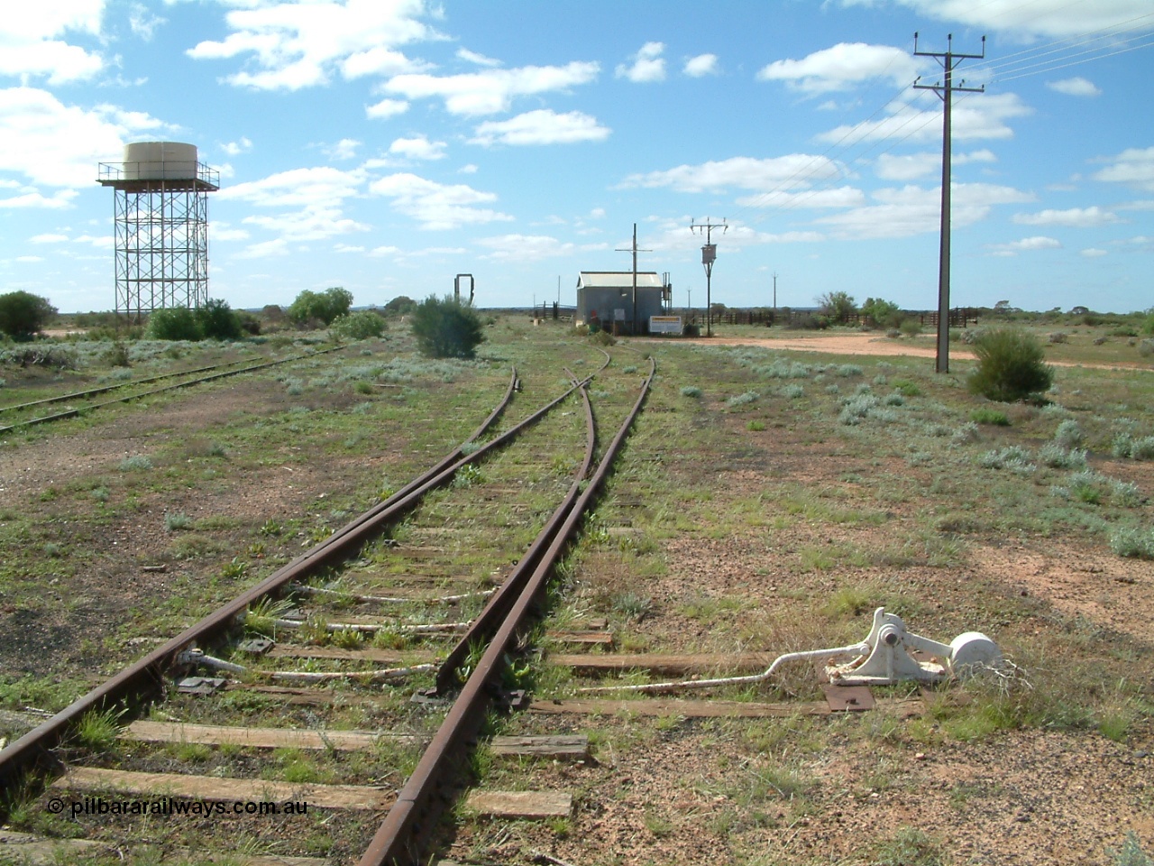 030415 140953
Kingoonya, located at the 426.5 km on the Trans Australian Railway, looking north at the sidings, power station with cattle yards on the right. [url=https://goo.gl/maps/vha6CQXxnGPdXtKn6]GeoData location[/url].
