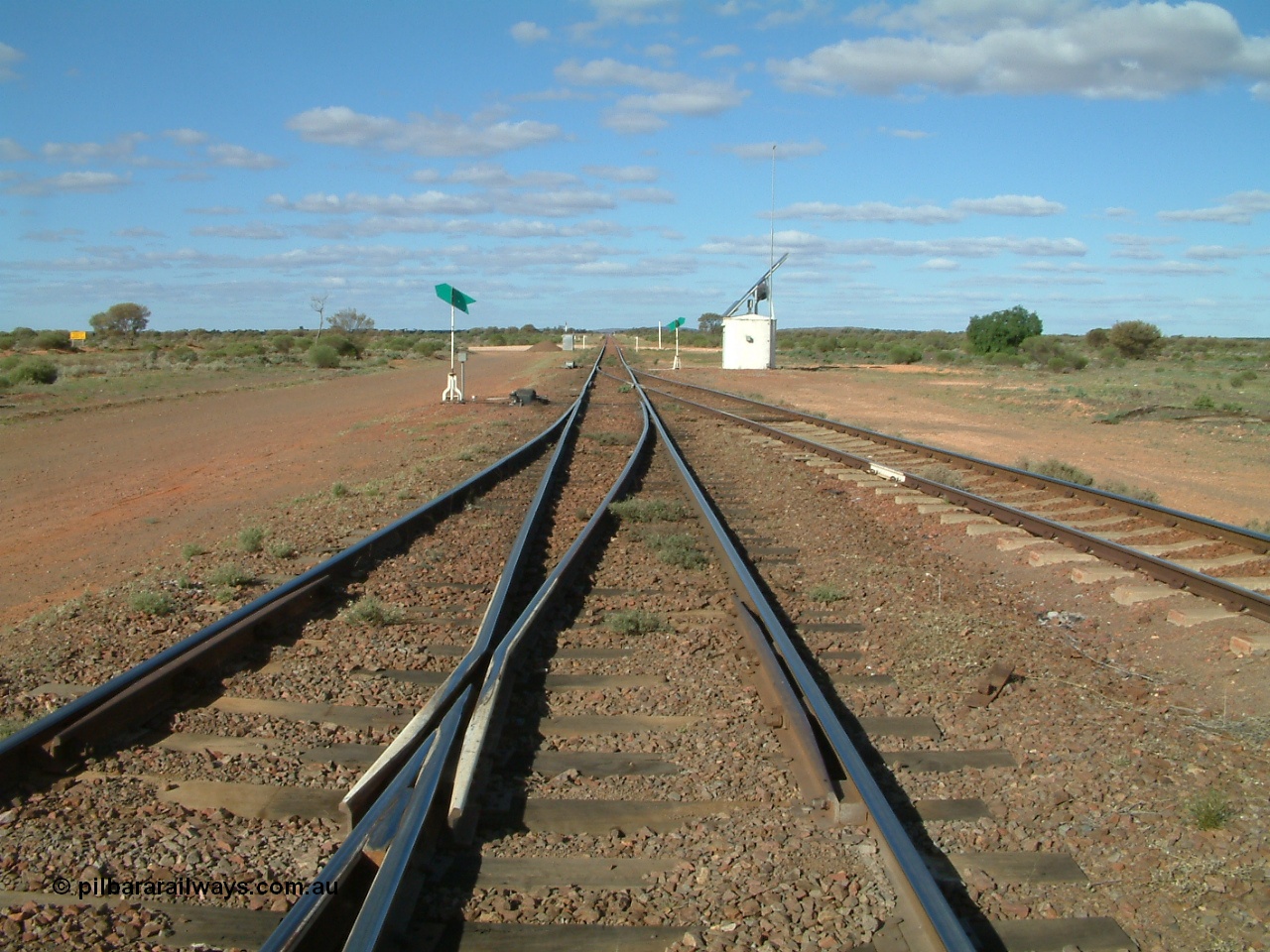 030415 155423
Tarcoola, looking east along the mainline towards Port Augusta, Central Australian Railway coming in from the left, Trans Australian Railway is the middle road with the loop on the right. Tarcoola is the junction for the TAR and CAR railways situated 504.5 km from the 0 km datum at Coonamia outside of Port Pirie. [url=https://goo.gl/maps/bJyV81LpHFFg7PGs7]GeoData location[/url]. 15th April 2003.
