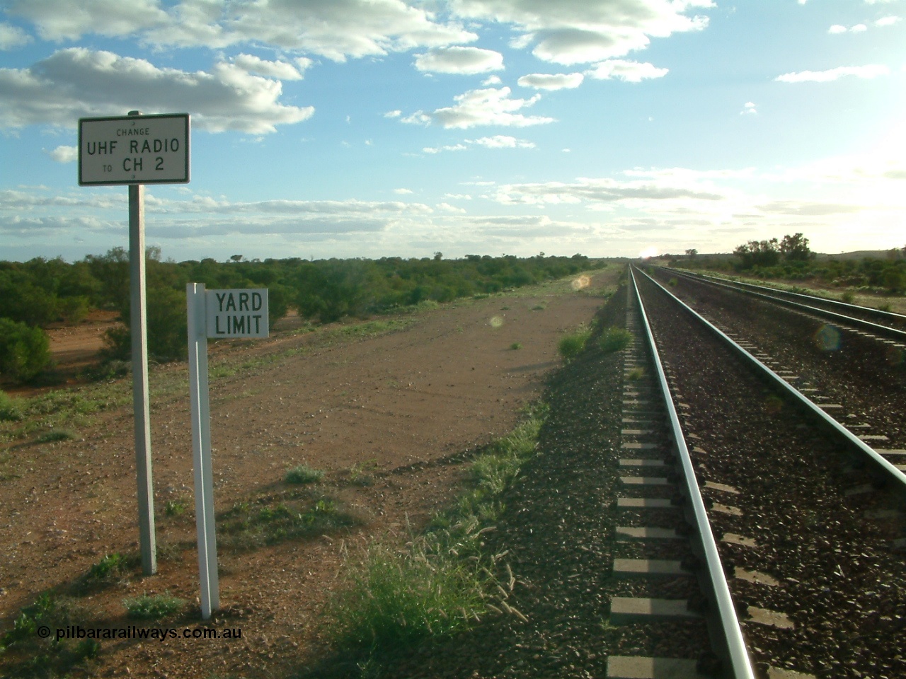 030415 171516
Tarcoola, at the 504.5 km, looking west along the Trans Australian line, Central Australian line on the right at the western yard limit and radio channel change boards. Tarcoola is the junction for the TAR and CAR railways. [url=https://goo.gl/maps/HiaY1eD55ojKxzvt6]GeoData location[/url]. 15th April 2003.
