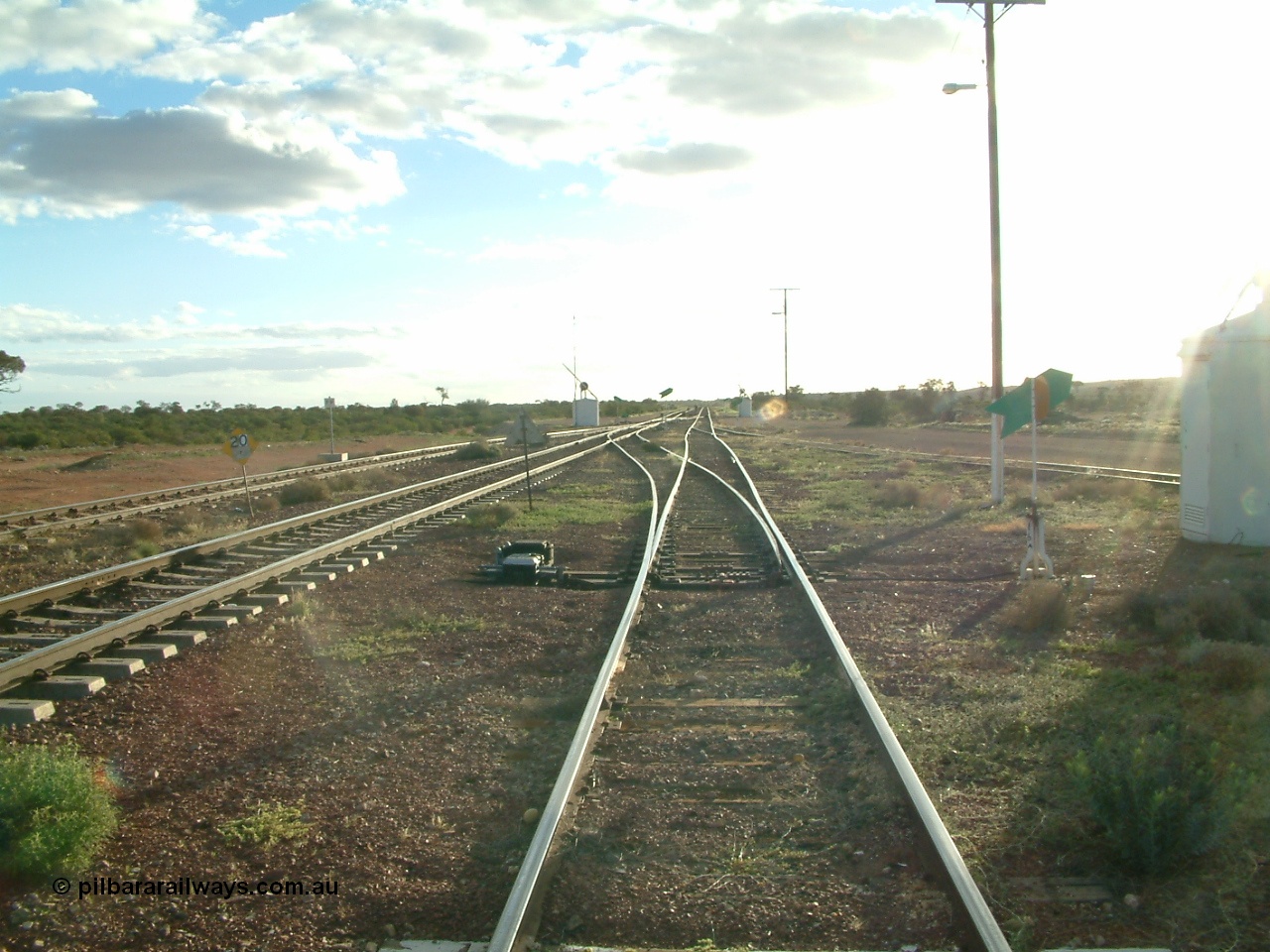 030415 172140
Tarcoola, at the 504.5 km, looking west along the Central Australian Line, Trans Australian is the middle road with the loop rejoining on the far left in the distance. Tarcoola is the junction for the TAR and CAR railways. [url=https://goo.gl/maps/Q9Zk6vaHoH2d2LTt5]GeoData location[/url]. 15th April 2003.
