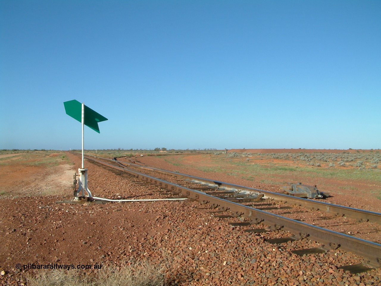 030416 082452
555 Quarry, which is located at the 554.8 km from the 0 km datum from Coonamia or just 50 km from Tarcoola. Looking south towards Tarcoola with the points for the siding with it running away to the west. [url=https://goo.gl/maps/sbcnkK8DQJU4Z6eN9]GeoData location[/url]. 16th April 2003.
