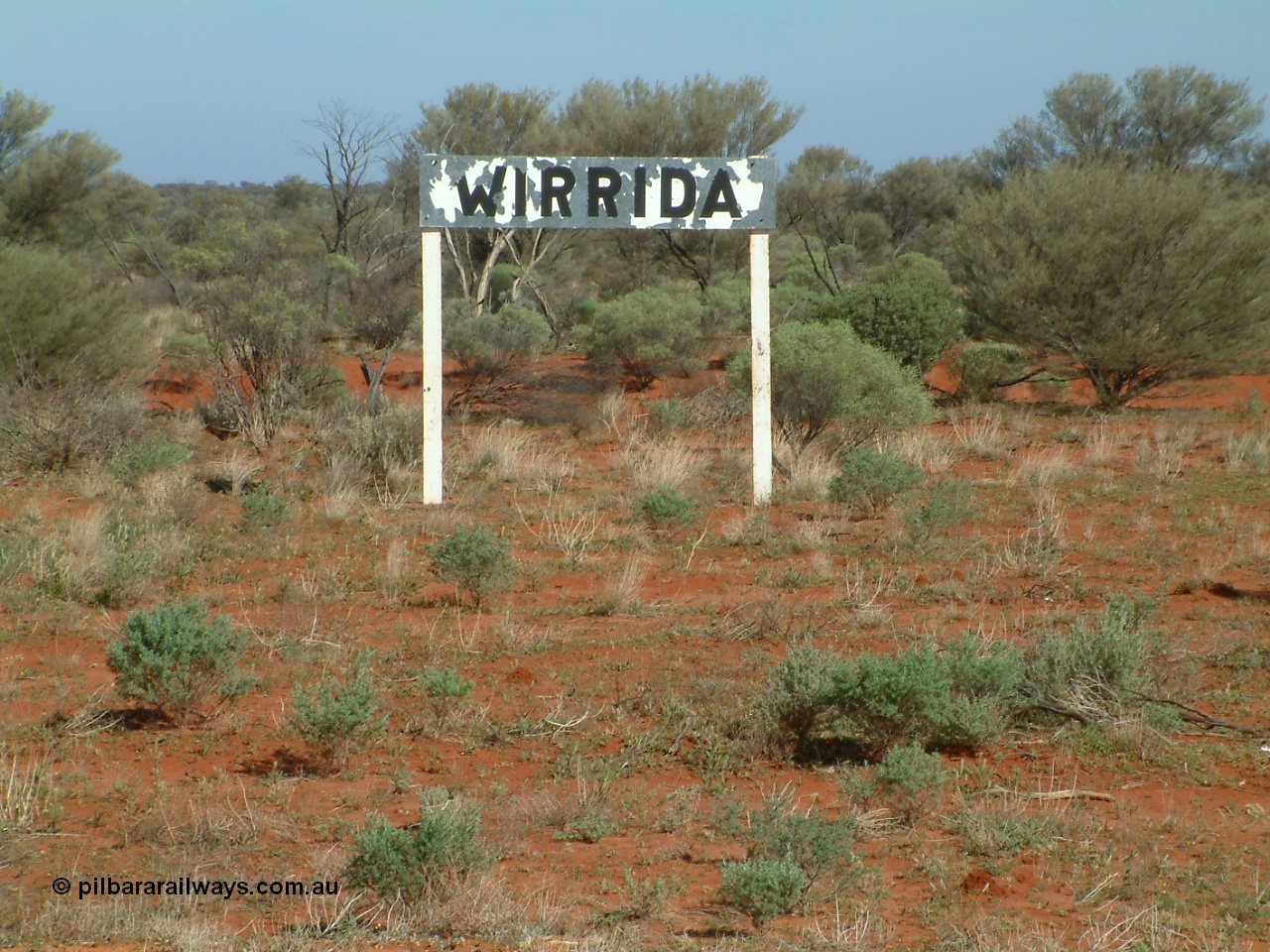 030416 095122
Wirrida Siding station nameboard. Located at the 641 km from the 0 datum at Coonamia and 137 km north of Tarcoola between Carnes and Manguri on the Tarcoola - Alice Springs line. [url=https://goo.gl/maps/zV1HEGVERomC6riq7]GeoData location[/url]. 16th April 2003.
