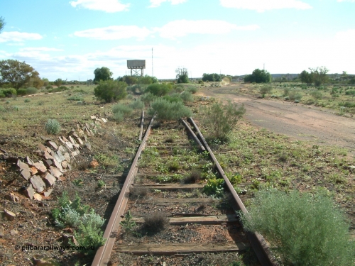 030415 155301
Tarcoola, at the 504.5 km, looking west, removed points for No. 1 Water Road joining the Camp Train Road. Town is to the far north west, and the mainline is on the right. [url=https://goo.gl/maps/hwYG6SvtzrBQZfSMA]GeoData location[/url]. 15th April 2003.
