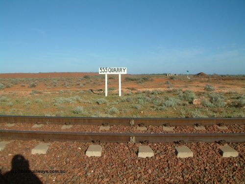 030416 082046
555 Quarry, which is located at the 554.8 km from the 0 km datum from Coonamia or just 50 km from Tarcoola. Looking west across the mainline, siding can be seen on the right. Siding nameboard. [url=https://goo.gl/maps/8L1dSkj8dde4Tk5Q6]GeoData location[/url]. 1April 6, 2003.
