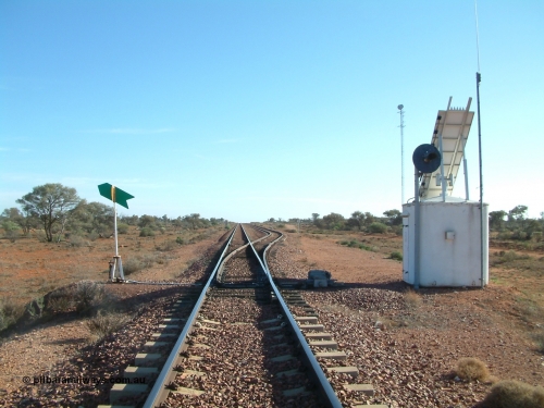 030416 083542
Carnes Siding located at the 566.4 km on the Central Australian line from Tarcoola to Alice Springs. View of the line and loop looking north from the south end with point indicator, interlocking hut and repeater signal and communications tower in the background. [url=https://goo.gl/maps/d5okP7KUhaCnCJaVA]GeoData location[/url]. 1April 6, 2003.
