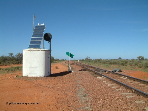 030416 095502
Wirrida Siding, looking south towards Tarcoola from the north end of the loop, concrete interlocking hut with searchlight repeater signal, point indicator, communications tower in the distance on the left and train control 'pillbox' on the right. Located at the 641 km from the 0 datum at Coonamia and 137 km north of Tarcoola between Carnes and Manguri on the Tarcoola - Alice Springs line. [url=https://goo.gl/maps/corZKNsBFkCGAnkR8]GeoData location[/url]. 1April 6, 2003.
