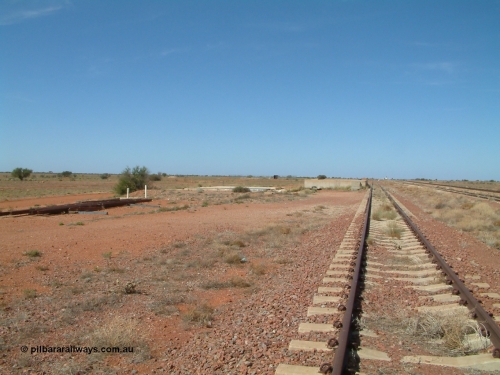 030416 110102
Manguri Siding, looking south along the third road or goods siding, loading platform, located 706.5 km from the 0 datum at Coonamia and 200 km north of Tarcoola between Wirrida and Cadney Park on the Tarcoola - Alice Springs line. [url=https://goo.gl/maps/y8coKnvDBraSuT8G7]GeoData location[/url]. 1April 6, 2003.
