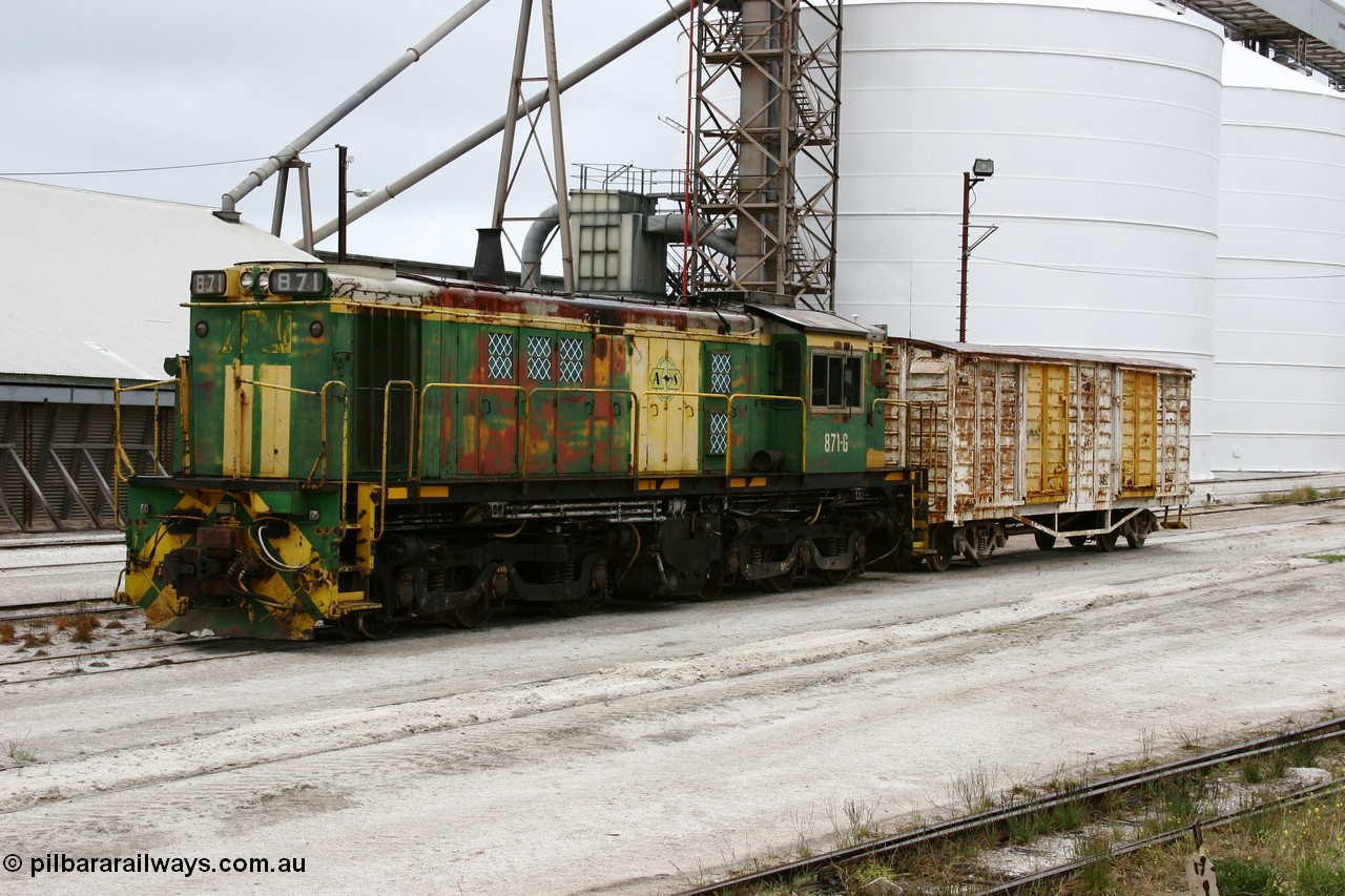 051102 6611
Thevenard, AE Goodwin ALCo model DL531 830 class locomotive 871 serial G3422-1, issued when built in 1966 to the Eyre Peninsula division of South Australian Railways. Still wearing Australian National green and yellow but with ASR decals as it stands in the yard coupled to an ENBA type louvre van.
Keywords: 830-class;871;G3422-1;AE-Goodwin;ALCo;DL531;