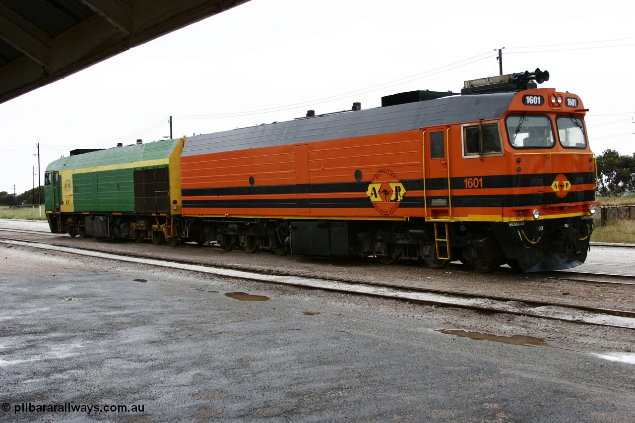 051102 6618
Thevenard, two versions of Clyde Engineering EMD JL22C model, class leader 1601, originally NJ 1 'Ben Chifley' serial 71-728, and NJ 6 serial 71-733, both built in 1971 at Clyde's Granville NSW workshops, started out on the Central Australia Railway for the Commonwealth Railways before being transferred to the Eyre Peninsula system in 1981, NJ 1 repainted and renumbered to 1601 in November 2004.
Keywords: 1600-class;1601;71-728;Clyde-Engineering-Granville-NSW;EMD;JL22C;NJ-class;NJ1;