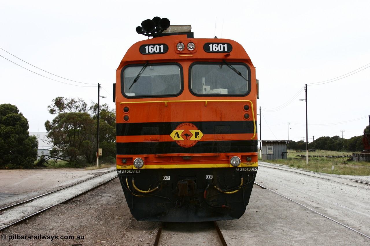 051102 6621
Thevenard, front view of Clyde Engineering EMD JL22C model unit and class leader 1601, originally NJ 1 'Ben Chifley' serial 71-728, built in 1971 at Clyde's Granville NSW workshops, started out on the Central Australia Railway for the Commonwealth Railways before being transferred to the Eyre Peninsula system in 1981, repainted and renumbered to 1601 in November 2004.
Keywords: 1600-class;1601;71-728;Clyde-Engineering-Granville-NSW;EMD;JL22C;NJ-class;NJ1;