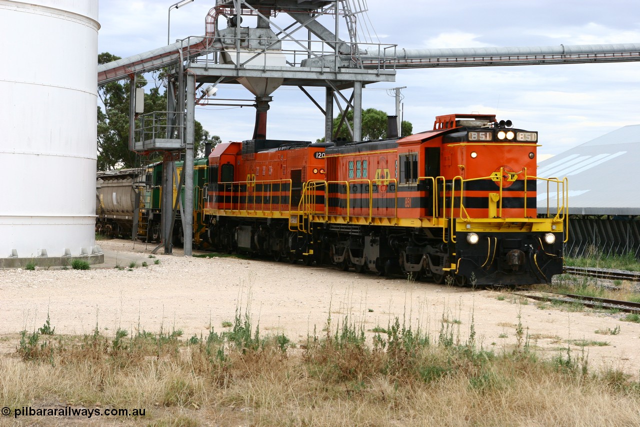 060108 2087
Lock, grain train loading almost completed as 830 class unit 851 an AE Goodwin built ALCo DL531 model serial 84137 and repainted into Australian Railroad Group livery with EMD 1200 class unit 1204 and sister 830 class 842 prepare their train for departure. 8th January 2006.
Keywords: 830-class;851;AE-Goodwin;ALCo;DL531;84137;