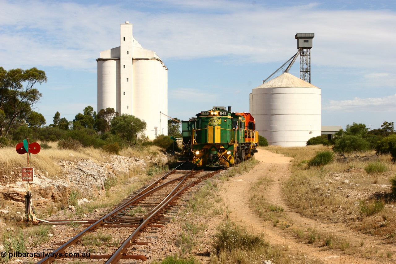 060109 2120
Kyancutta, ASR 830 class unit 842, an AE Goodwin built ALCo DL531 model loco serial 84140 leads EMD unit 1204 due to air-conditioning trouble and sister ALCo 851 as they shunt empty grain waggons on the silo loop. 9th January 2006.
Keywords: 830-class;842;AE-Goodwin;ALCo;DL531;84140;