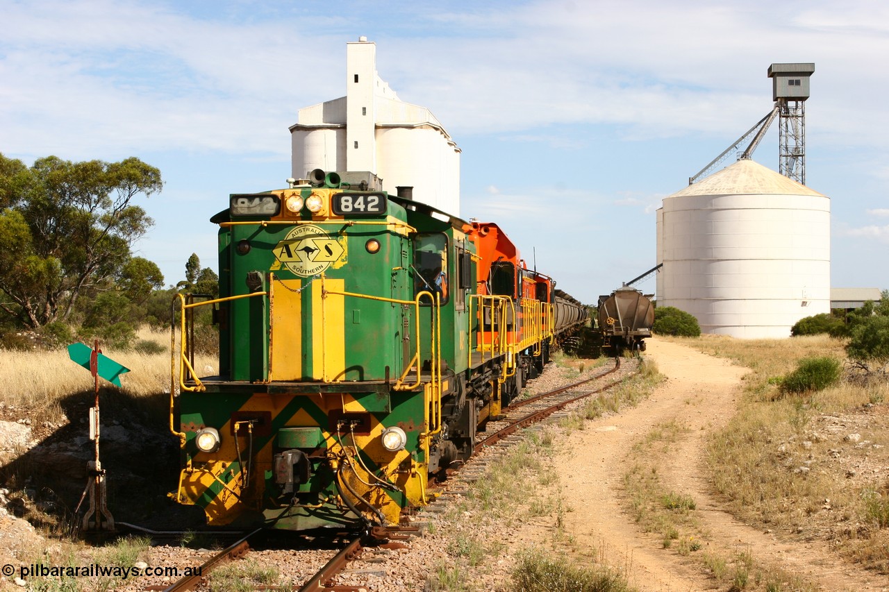 060109 2131
Kyancutta, ASR 830 class unit 842, an AE Goodwin built ALCo DL531 model loco serial 84140 leads EMD unit 1204 due to air-conditioning trouble and sister ALCo 851 as they re-join the train on the mainline. 9th January 2006.
Keywords: 830-class;842;AE-Goodwin;ALCo;DL531;84140;