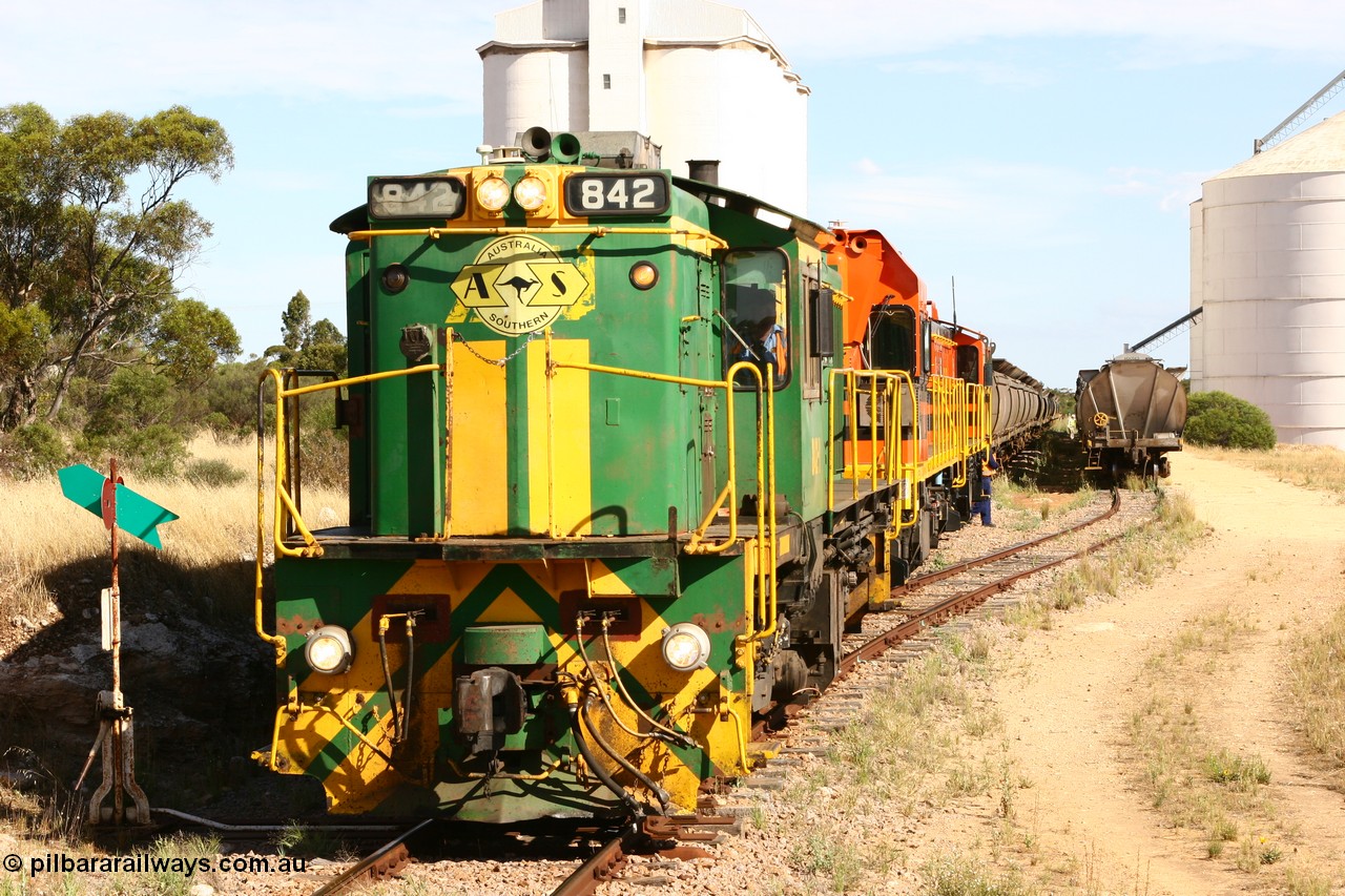 060109 2132
Kyancutta, ASR 830 class unit 842, an AE Goodwin built ALCo DL531 model loco serial 84140 leads EMD unit 1204 due to air-conditioning trouble and sister ALCo 851 as they re-join the train on the mainline. 9th January 2006.
Keywords: 830-class;842;84140;AE-Goodwin;ALCo;DL531;