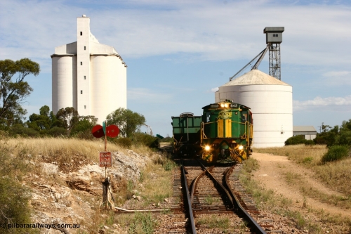 060109 2125
Kyancutta, ASR 830 class unit 842, an AE Goodwin built ALCo DL531 model loco serial 84140 leads EMD unit 1204 due to air-conditioning trouble and sister ALCo 851 as they shunt empty grain waggons on the silo loop. January 9, 2006.
Keywords: 830-class;842;AE-Goodwin;ALCo;DL531;84140;