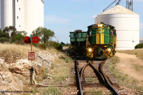 060109 2126
Kyancutta, ASR 830 class unit 842, an AE Goodwin built ALCo DL531 model loco serial 84140 leads EMD unit 1204 due to air-conditioning trouble and sister ALCo 851 as they shunt empty grain waggons on the silo loop. January 9, 2006.
Keywords: 830-class;842;AE-Goodwin;ALCo;DL531;84140;