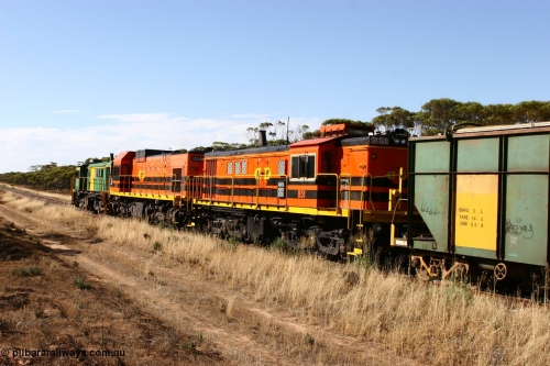 060109 2145
Wannamana, [url=https://goo.gl/maps/43EOs]on the curve[/url] 2 km north of the former station site empty train 830 class unit 851 AE Goodwin built ALCo DL531 model serial 84137 repainted into Australian Railroad Group livery with an EMD 1200 class and a sister ALCo unit on the lead. January 9, 2006.
Keywords: 830-class;851;AE-Goodwin;ALCo;DL531;84137;