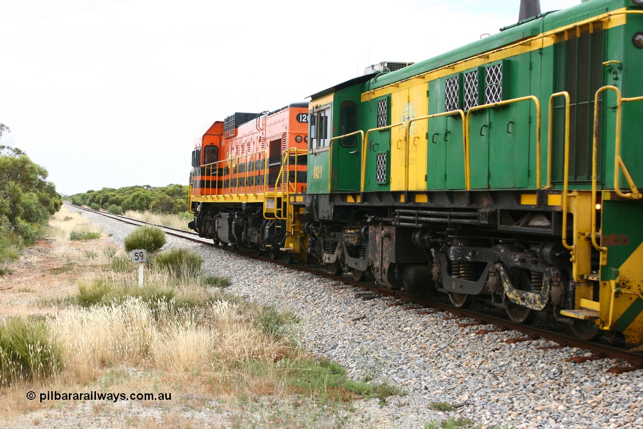 060110 2154
Pillana, former station site, 59 km, empty grain train behind ARG 1200 class unit 1204, a Clyde Engineering EMD model G12C serial 65-428, originally built for the WAGR as the final unit of fourteen A class locomotives in 1965 then sent to the Eyre Peninsula in July 2004, and two 830 class AE Goodwin built ALCo model DL531 units 842 serial 84140 ex SAR broad gauge to Eyre Peninsula in October 1987, and 851 serial 84137 new to Eyre Peninsula in 1962. [url=https://goo.gl/maps/BcnmpGwGqtw]Approx. location of photo[/url].
Keywords: 1200-class;1204;Clyde-Engineering-Granville-NSW;EMD;G12C;65-428;A-class;A1514;830-class;842;851;AE-Goodwin;ALCo;DL531;84137;84140;