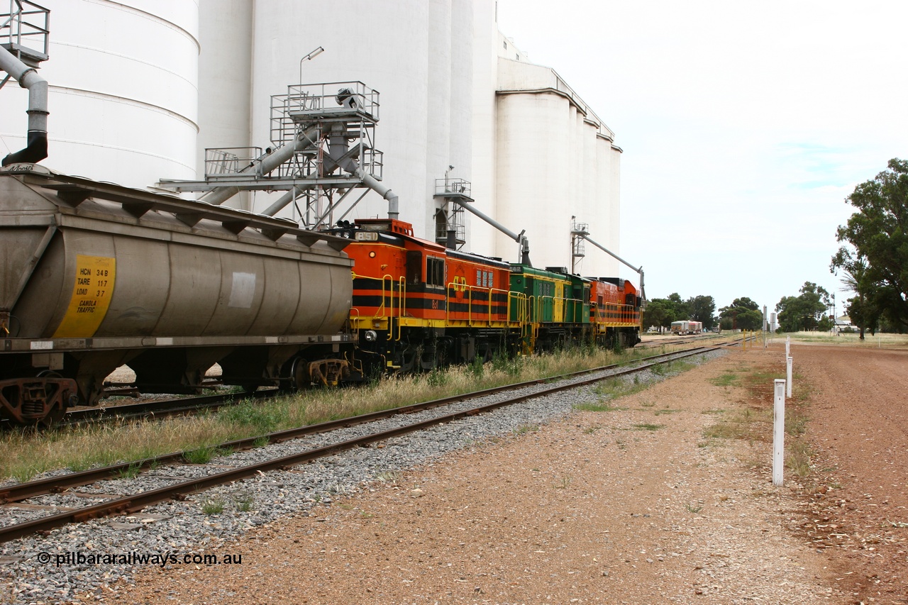 060110 2169
Cummins, trailing view of empty grain train running down the yard along the Penong mainline behind ARG 1200 class unit 1204, a Clyde Engineering EMD model G12C serial 65-428, originally built for the WAGR as the final unit of fourteen A class locomotives in 1965 and sent to the Eyre Peninsula in July 2004 and two 830 class AE Goodwin built ALCo model DL531 units 842 serial 84140 ex SAR broad gauge to Eyre Peninsula in October 1987, and 851 serial 84137 new to Eyre Peninsula in 1962. [url=https://goo.gl/maps/q5aVqSmjCP62]Approx. location of image[/url].
Keywords: 1200-class;1204;Clyde-Engineering-Granville-NSW;EMD;G12C;65-428;A-class;A1514;830-class;842;851;AE-Goodwin;ALCo;DL531;84137;84140;